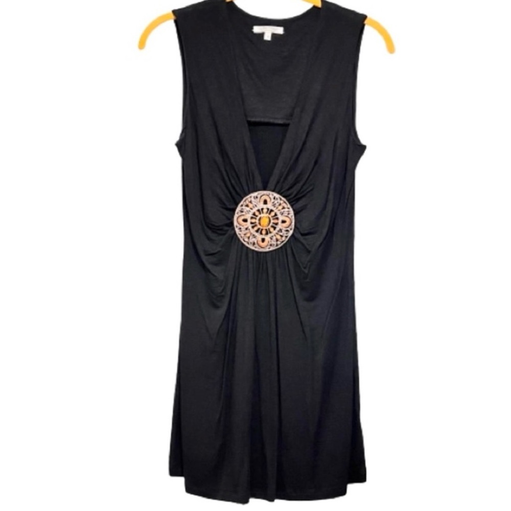 Women's Black Deep V-Neck Dress with Jeweled Medallion in Center.